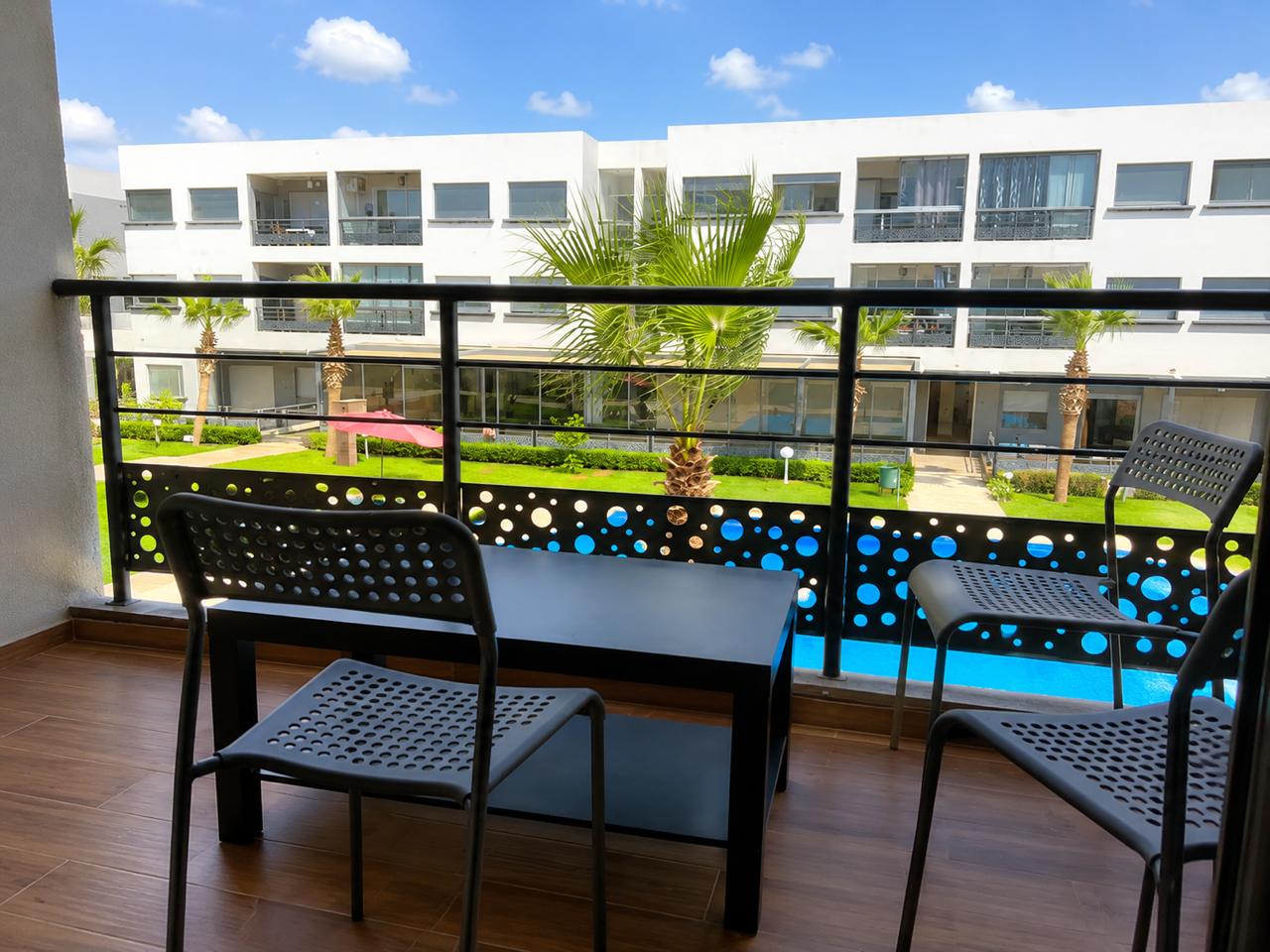 Appartement Élégant avec Vue sur Piscine – Résidence Magic House – El Mansouria - Galerie #1