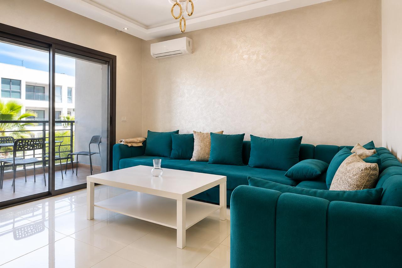 Appartement Élégant avec Vue sur Piscine – Résidence Magic House – El Mansouria